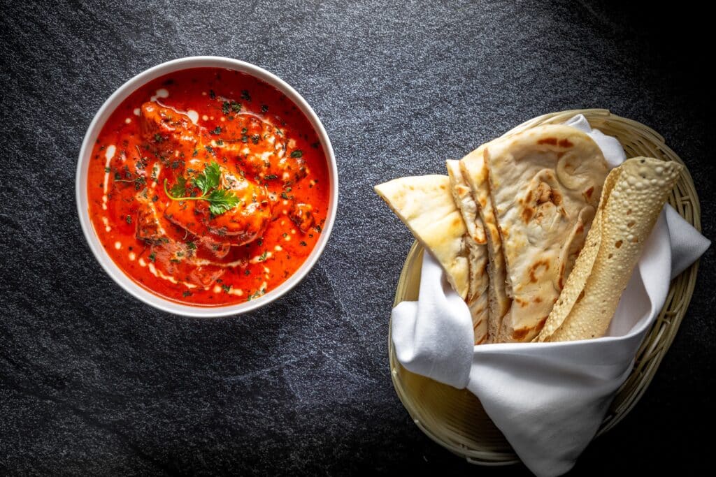 Butter Chicken with Tomato Gravy and Parotta, Papadum, Steamed Rice
