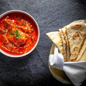 Butter Chicken with Tomato Gravy and Parotta, Papadum, Steamed Rice
